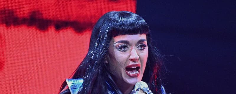 Katy Perry confirms relationship with former Canadian PM, revealing celebrities dating politicians.